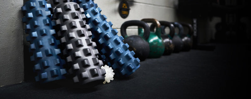 RumbleRoller and Beastie tools on a gym floor