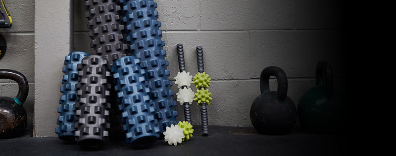 RumbleRoller rollers and Beastie tools together on a gym floor